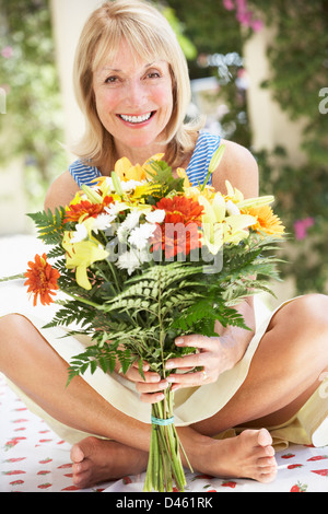 Romantic Portrait Of Senior Couple Embracing Outdoors Stock Photo