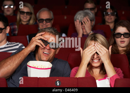 Couple Watching 3D Film In Cinema Stock Photo