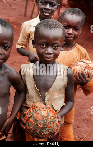 Central African Republic. August 2012. Batalimo camp for Congolese refugees. Young boys with home-made football Stock Photo