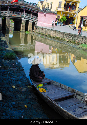 Old man in a boat in Hoi An, Vietnam Stock Photo - Alamy
