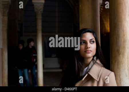 Young Latin woman in the Hall of Abencerrajes Stock Photo
