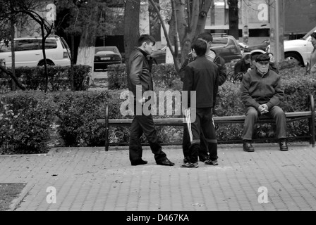 Group of Kazakh youths and old man, Almaty, Kazakhstan Stock Photo