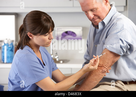 Doctor Giving Male Patient Injection Stock Photo