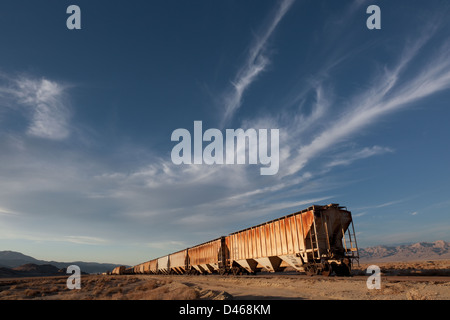 A freight train parked in a siding in the Californian desert near Trona Stock Photo