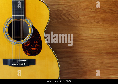 Guitar and wood background Stock Photo