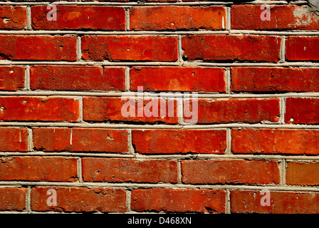 Piece of an old wall from a red brick Stock Photo