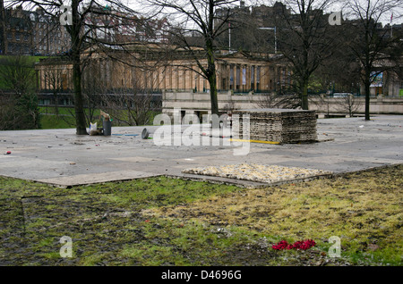 Damaged grass in Princes Street Gardens, Edinburgh, Scotland, after the removal of the Christmas Fair. Stock Photo
