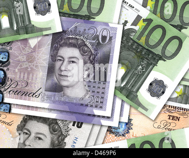 Ten and twenty pound notes overlaping hundred Euro money. £10, £20 & €100 currency bills. Stock Photo
