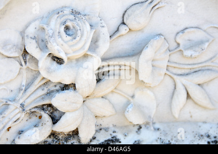 Carved flowers on an old marble gravestone, Warner, New Hampshire. Stock Photo