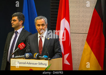 Berlin, Germany. 6th March, 2013.  Deputy Prime Minister of Turkey Bülent Arinç gives a speech about the 2023 Vision of the Turkish Government and Europe. the session was stoped by some protesters from TGB (Turkish Youth Union) against the current policy of Turkey.Credits: Credit:  Gonçalo Silva / Alamy Live News. Stock Photo