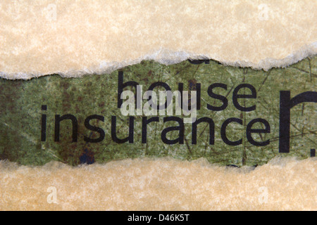House insurance text on paper hole Stock Photo