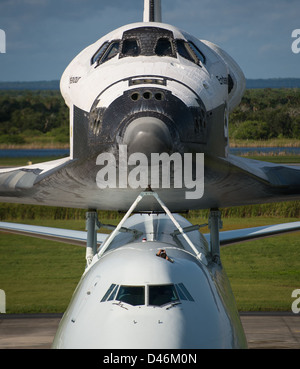 The Space Shuttle Endeavour is seen being transported atop the 747 ...