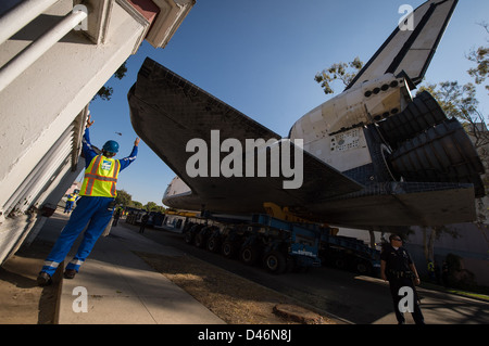 Space Shuttle Endeavour is transported by helicopter through Los ...