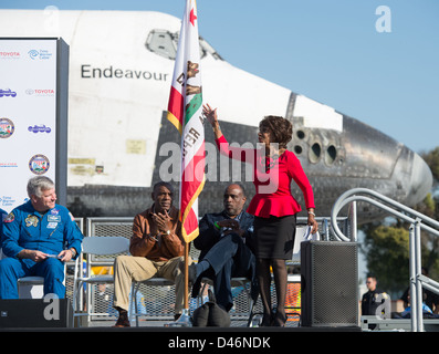 Space Shuttle Endeavour was transported via helicopter to its final ...