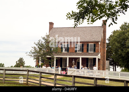 Civil War visitors tour the historic 1819 Clover Hill Tavern in Appomattox Court House National Historical Park near Appomattox, Virginia, USA. Stock Photo