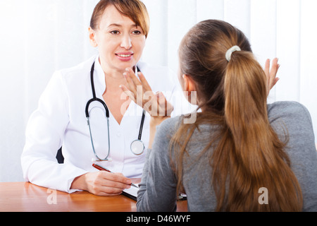 Doctor with female patient Stock Photo