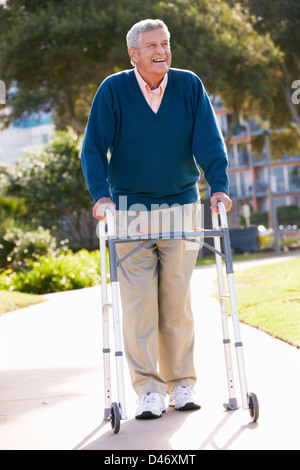 Senior Man With Walking Frame Stock Photo