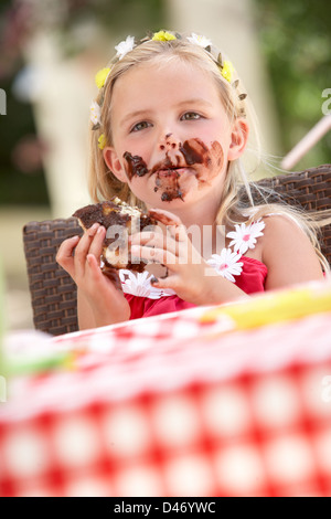 Messy Girl Eating Chocolate Cake Stock Photo