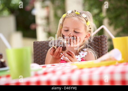 Messy Girl Eating Chocolate Cake Stock Photo