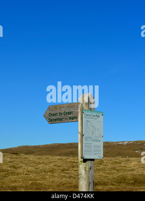 'Coast to Coast December - April', public bridleway fingerpost. Nateby Fell, Lake District National Park, Cumbria, England, U.K. Stock Photo