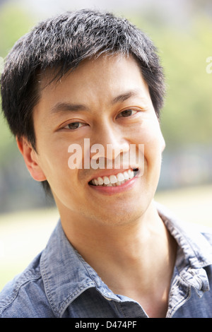 Head And Shoulders Portrait Of Chinese Man Stock Photo