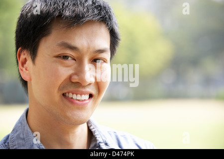 Head And Shoulders Portrait Of Chinese Man Stock Photo