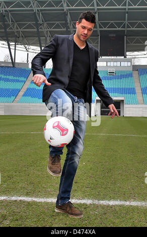 Leipzig, Germany. 7th March 2013. Former German national soccer player Michael Ballack poses for photographs after a press conference about his farewell match at Red Bull Arena. Ballack will play his last soccer match with celebrities at the WM-Arena in Leipzig at the beginning of June. Photo: JAN WOITAS/dpa/Alamy Live News Stock Photo