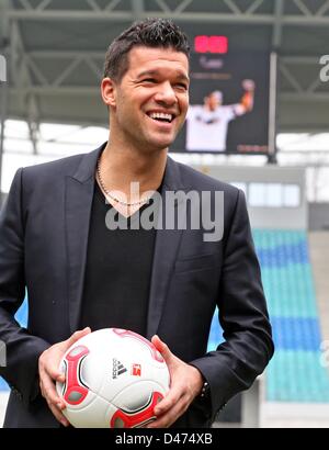 Leipzig, Germany. 7th March 2013. Former German national soccer player Michael Ballack poses for photographs after a press conference about his farewell match at Red Bull Arena. Ballack will play his last soccer match with celebrities at the WM-Arena in Leipzig at the beginning of June. Photo: JAN WOITAS/dpa/Alamy Live News Stock Photo