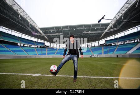 Leipzig, Germany. 7th March 2013. Former German national soccer player Michael Ballack poses for photographs after a press conference about his farewell match at Red Bull Arena. Ballack will play his last soccer match with celebrities at the WM-Arena in Leipzig at the beginning of June. Photo: JAN WOITAS/dpa/Alamy Live News Stock Photo