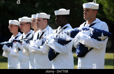 Sailors participate in a flag decommissioning ceremony at Fort Meade. Stock Photo