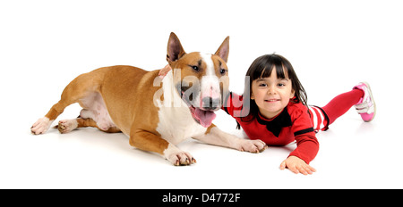 Cute young girl posing with her Bull Terrier Stock Photo
