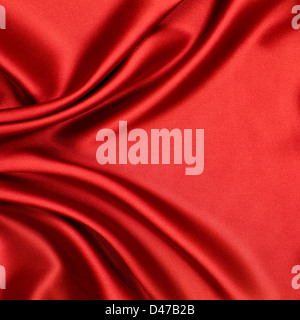 red satin or silk fabric as background Stock Photo