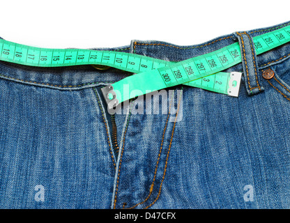 measuring tape around womans trousers Stock Photo