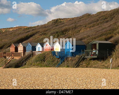 Beach huts at Barton-on-Sea on a sunny day at Barton on Sea, Hampshire ...