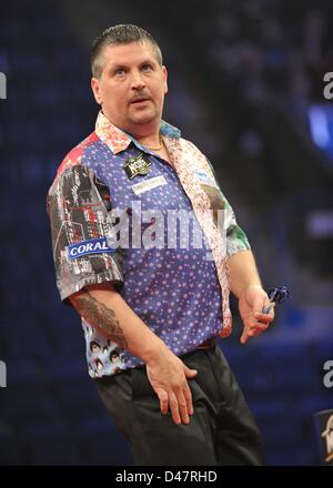 07.03.2013 Nottingham, England.  Gary Anderson in action during round Five of the Premier League Darts from the Capital FM Arena. Stock Photo