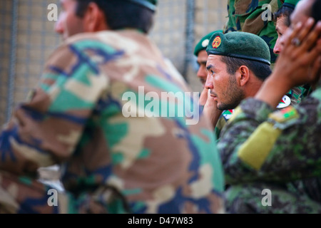 Kandahar, Afghanistan - September 24, 2010:  An Afghan National Army Soldier listens intently during a training session.