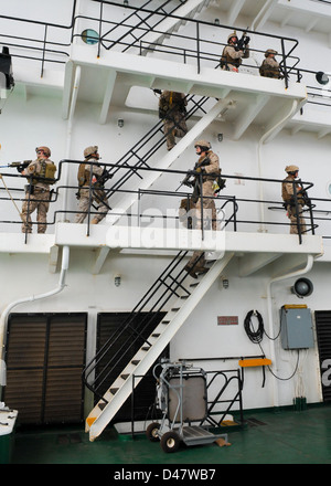Sailors and Marines conduct visit, board, search and seizure exercises. Stock Photo