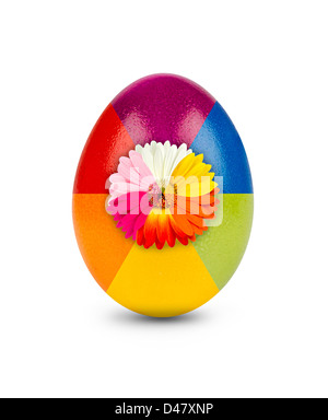multicolored easter egg decorated with gebera blossom Stock Photo