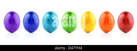 row of painted easter eggs in rainbow colors. Stock Photo