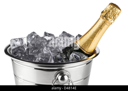 bottle of champagne in cooler with ice cubes Stock Photo