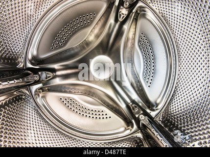 Closeup of the interior of empty and clean laundromat Stock Photo