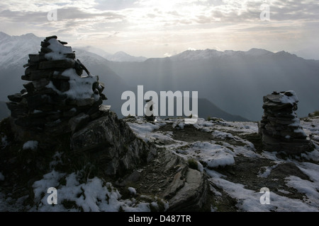 The peak of Chandrashila, the lowest Himalayan peak that is named (4100m), in the heart of the Garhwal mountains, at sunrise. Stock Photo