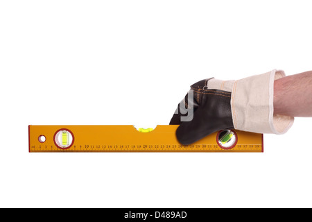 water level with a hand in working glove. Stock Photo