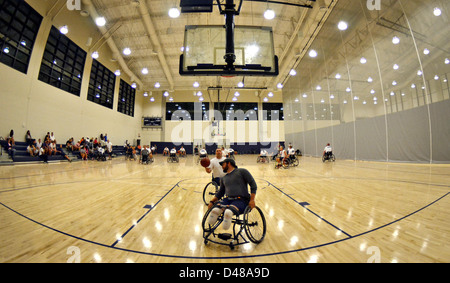 Wounded warriors practice wheelchair basketball. Stock Photo