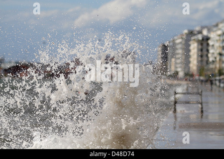 Big waves heat the seafront of a big city Stock Photo