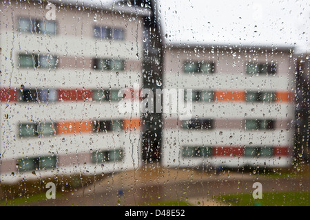 Rain drops running down a window. UK. Stock Photo