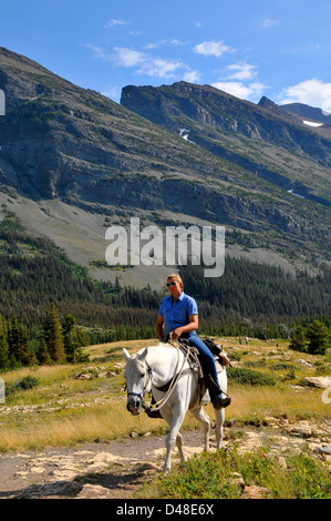 Horseback Riding Glacier National Park Montana MT US Stock Photo