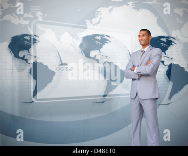 Businessman standing against world map interface Stock Photo