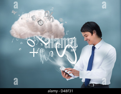 Happy businessman connecting to cloud computing Stock Photo