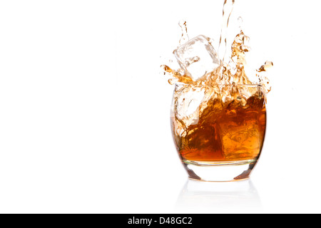 https://l450v.alamy.com/450v/d48gc2/ice-cube-falling-into-glass-of-whisky-d48gc2.jpg